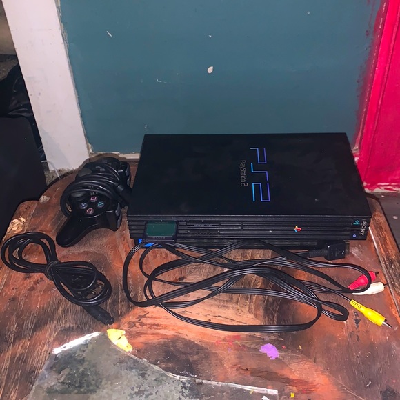 PlayStation 2, has all the cords and a controller. The PS4 still works.